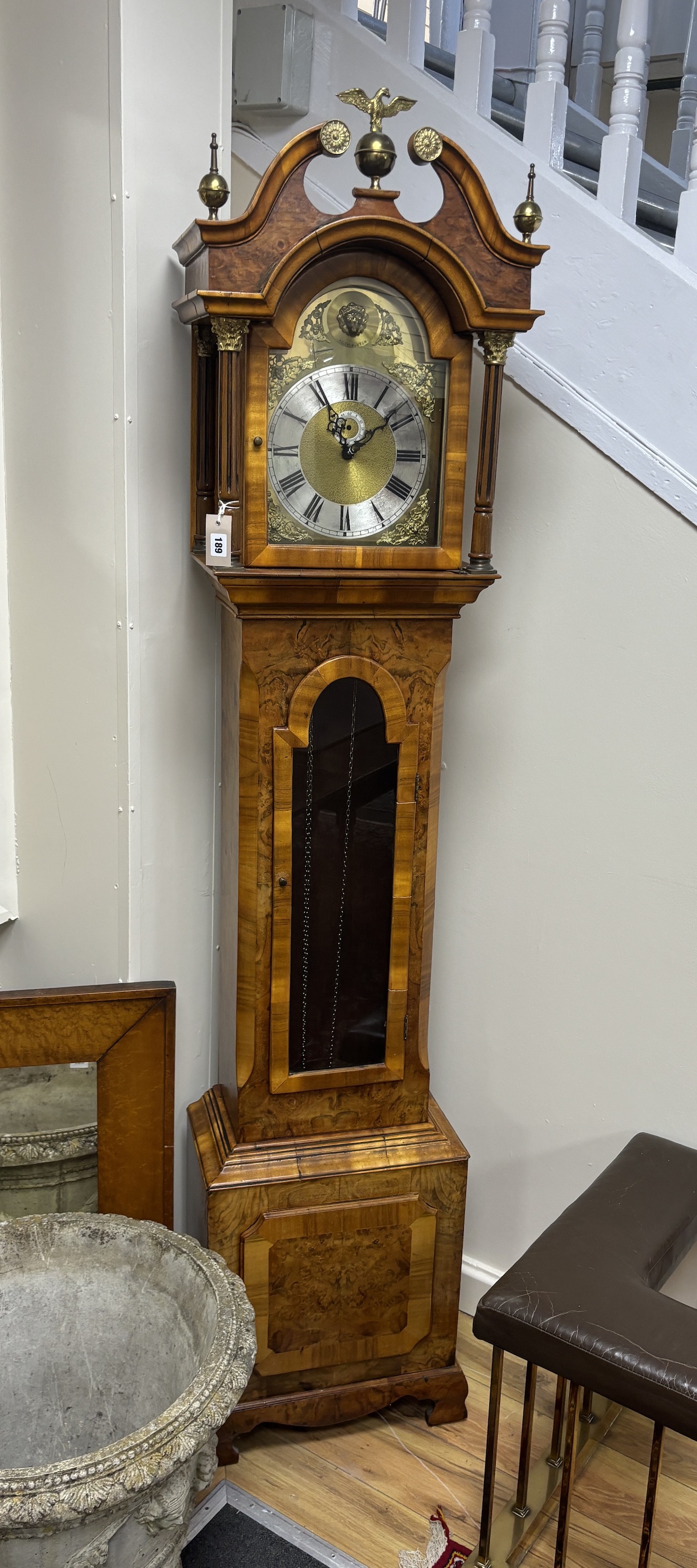 A reproduction yew Westminster chiming longcase clock, marked Keith Buxton, height 212cm